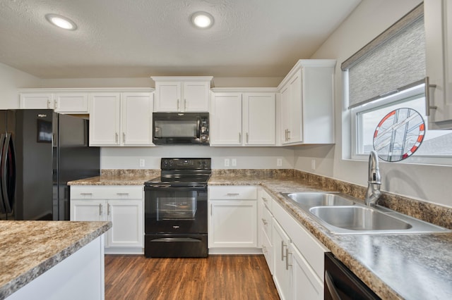 358 W Granada St, Republic, MO 65738 - kitchen featuring black appliances, a sink, white cabinetry, dark wood finished floors, and a textured ceiling