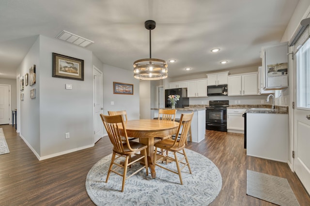 358 W Granada St, Republic, MO 65738 - dining area with recessed lighting, dark wood-style flooring, baseboards, and a chandelier