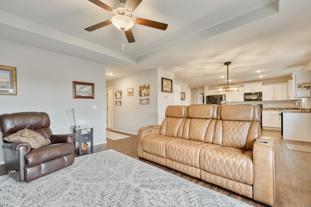 358 W Granada St, Republic, MO 65738 - living room with light wood-style floors, baseboards, a ceiling fan, and recessed lighting