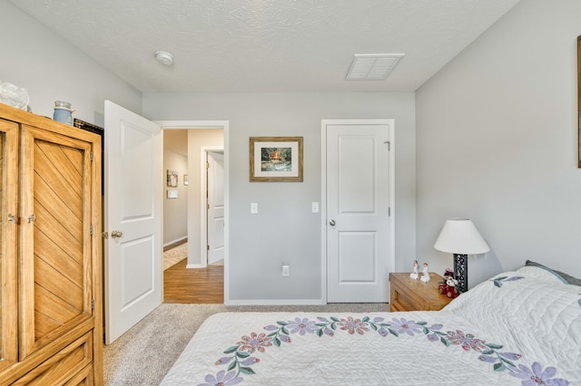 358 W Granada St, Republic, MO 65738 - bedroom featuring carpet flooring, a textured ceiling, and baseboards