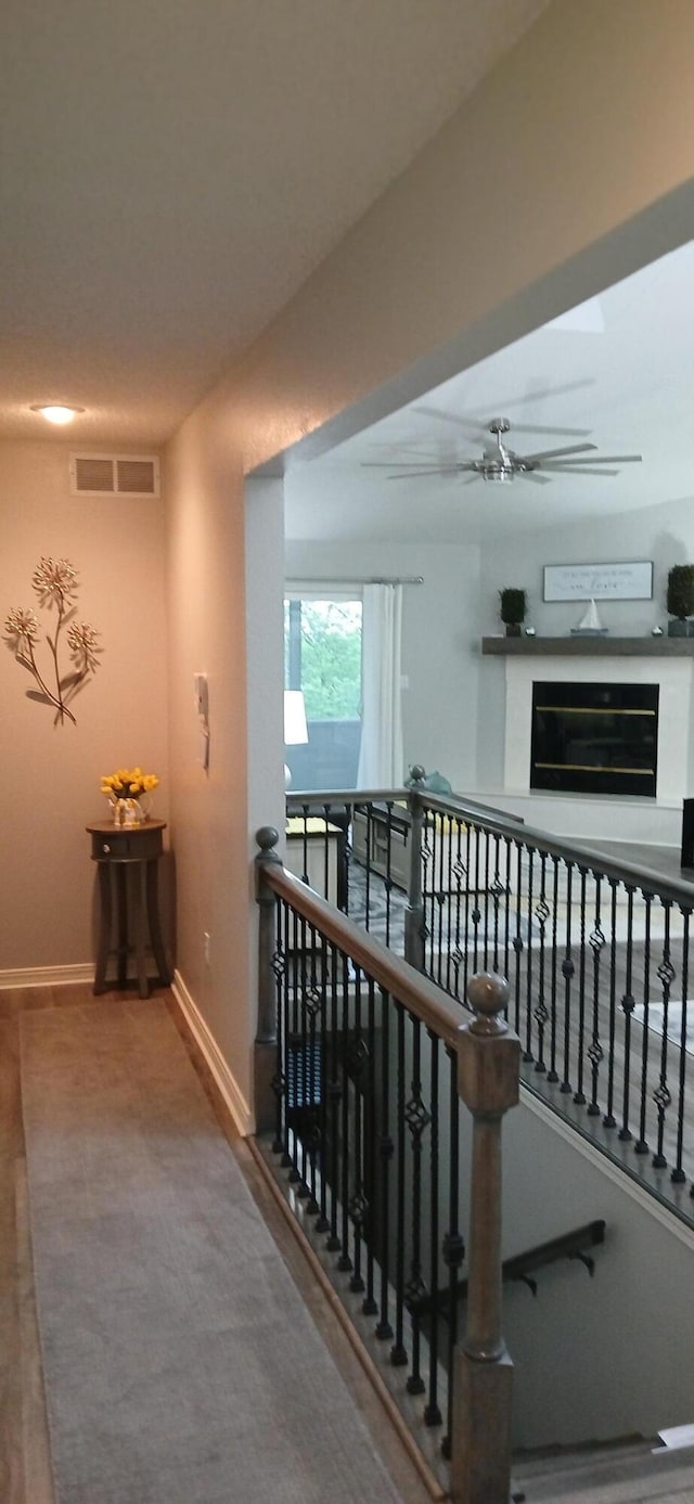 95 Starboard Dr, Kimberling City, MO 65686 - corridor featuring an upstairs landing and baseboards