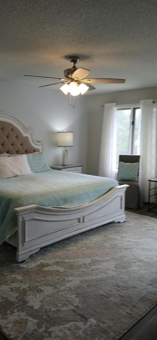 95 Starboard Dr, Kimberling City, MO 65686 - bedroom featuring a textured ceiling and ceiling fan