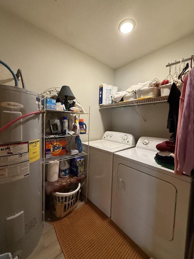 310 Mulling Dr, Highlandville, MO 65669 - laundry room with electric water heater, separate washer and dryer, and light wood finished floors