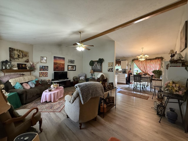 310 Mulling Dr, Highlandville, MO 65669 - living area with a chandelier, light wood-style floors, and ceiling fan