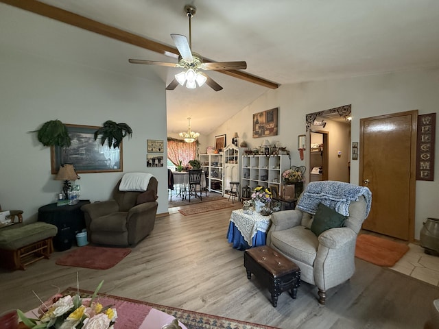 310 Mulling Dr, Highlandville, MO 65669 - living room featuring a ceiling fan, a chandelier, and wood finished floors