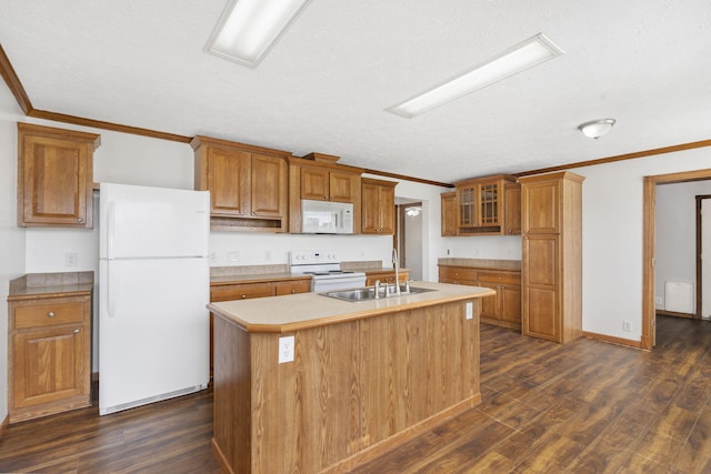 kitchen featuring white appliances, a sink, dark wood-style floors, ornamental molding, and brown cabinets