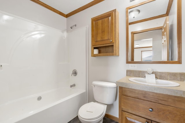 full bathroom with ornamental molding, toilet, bathing tub / shower combination, and vanity