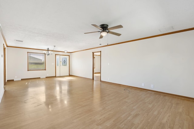 unfurnished living room featuring ornamental molding, light wood-style flooring, a ceiling fan, and baseboards
