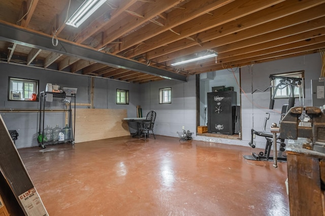 below grade area featuring concrete block wall