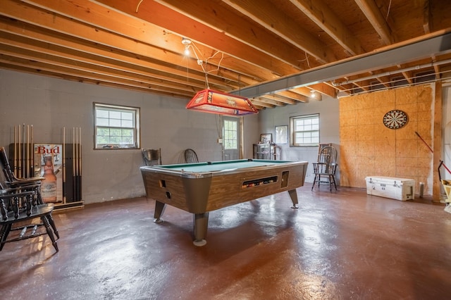 game room with concrete flooring, billiards, and healthy amount of natural light