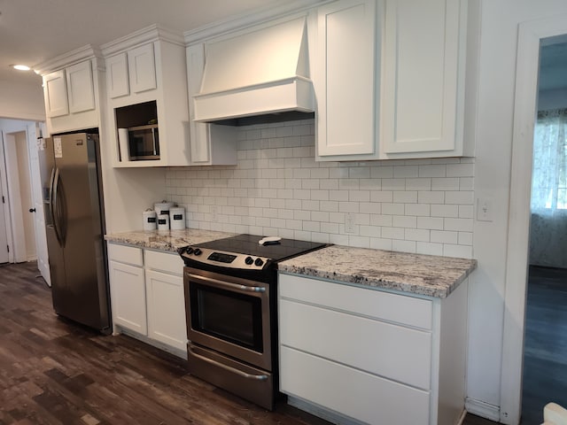 4181 S 105th Rd, Bolivar, MO 65613 - kitchen featuring appliances with stainless steel finishes, custom range hood, dark wood-style floors, and white cabinetry