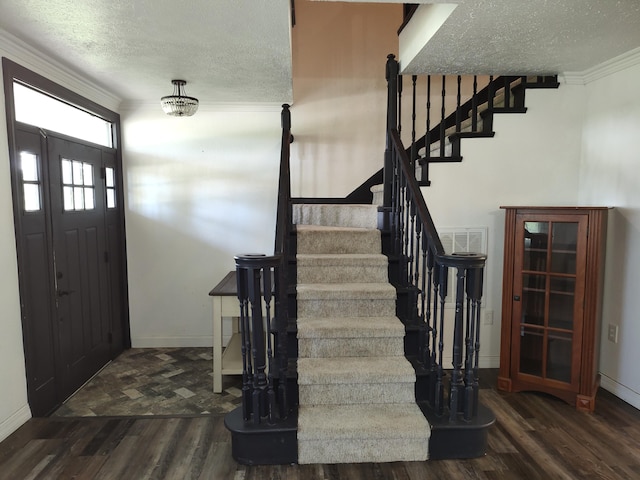 4181 S 105th Rd, Bolivar, MO 65613 - entryway with wood finished floors, a textured ceiling, stairs, baseboards, and ornamental molding