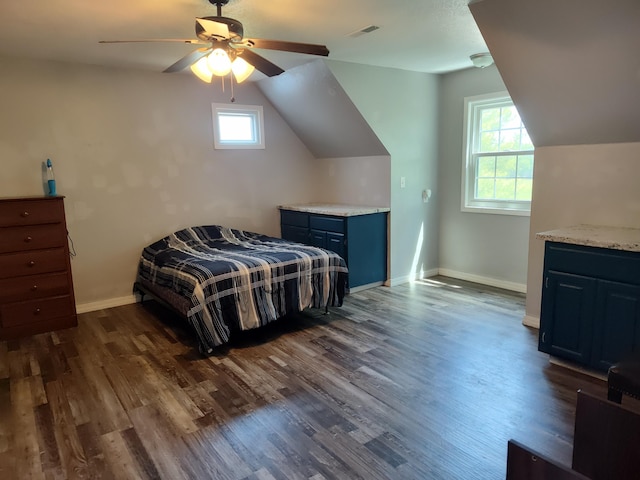 4181 S 105th Rd, Bolivar, MO 65613 - bedroom with dark wood-type flooring, baseboards, vaulted ceiling, and ceiling fan