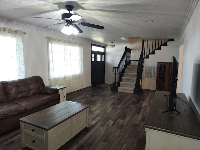 4181 S 105th Rd, Bolivar, MO 65613 - living area with stairway, dark wood-type flooring, ornamental molding, ceiling fan, and a textured ceiling