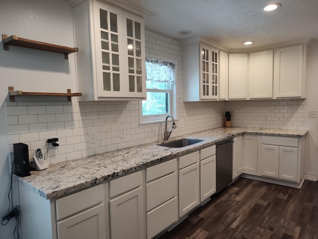 4181 S 105th Rd, Bolivar, MO 65613 - kitchen with a sink, stainless steel dishwasher, dark wood finished floors, white cabinetry, and decorative backsplash