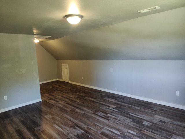 4181 S 105th Rd, Bolivar, MO 65613 - bonus room featuring dark wood-type flooring, vaulted ceiling, and baseboards