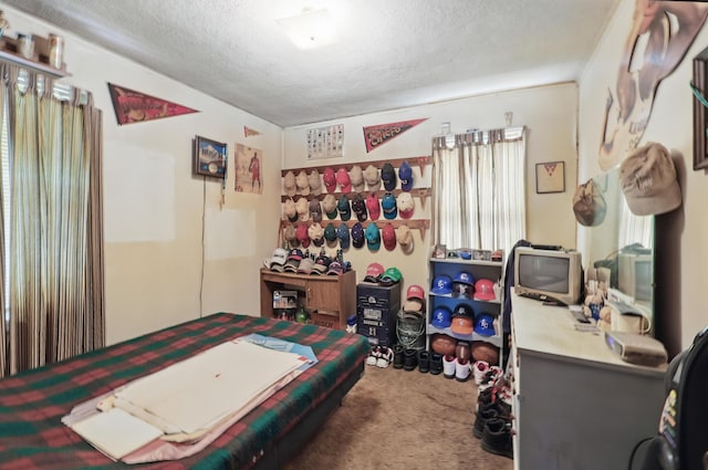 1014 Sycamore, Carthage, MO 64836 - carpeted bedroom with a textured ceiling