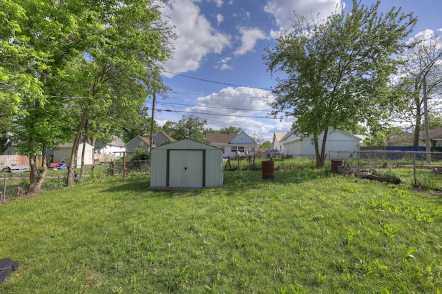 1014 Sycamore, Carthage, MO 64836 - view of yard featuring a storage unit, an outbuilding, and a residential view