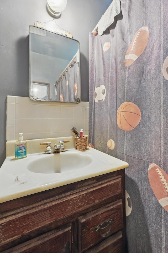 1014 Sycamore, Carthage, MO 64836 - bathroom featuring vanity and backsplash