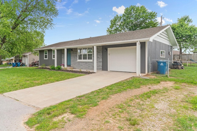 ranch-style home with an attached garage and concrete driveway