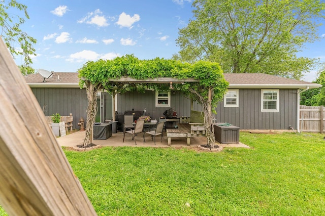 rear view of property with an outdoor hangout area, a patio, and roof with shingles