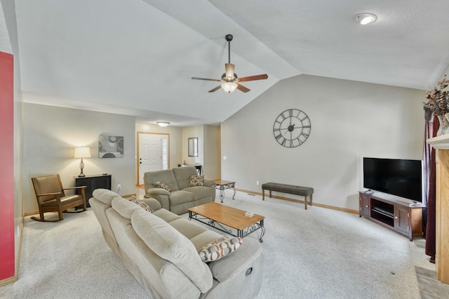 carpeted living room with baseboards, a ceiling fan, and vaulted ceiling