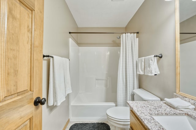 full bathroom with toilet, vanity, and shower / bath combo with shower curtain