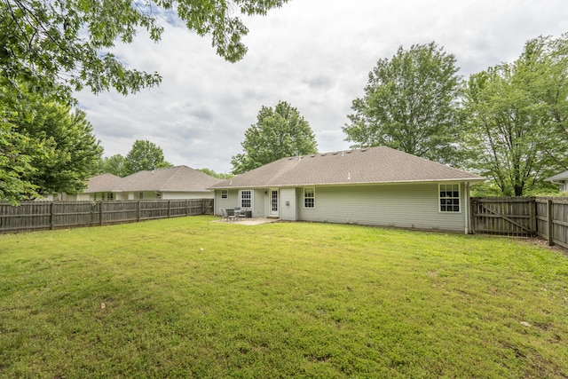 back of property with a patio area