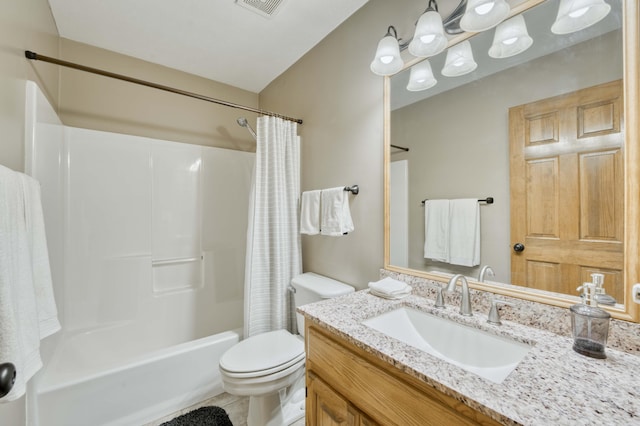full bathroom featuring toilet, shower / bath combo with shower curtain, and vanity