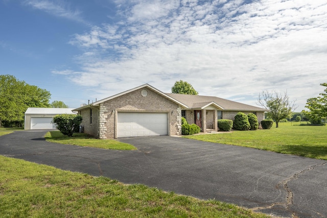 9169 W Farm Road 60, Willard, MO 65781 - single story home with brick siding, a front yard, an attached garage, and driveway