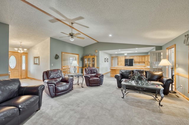 9169 W Farm Road 60, Willard, MO 65781 - living room with vaulted ceiling, light carpet, baseboards, a chandelier, and a textured ceiling
