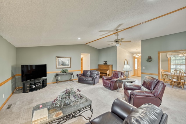 9169 W Farm Road 60, Willard, MO 65781 - living room with carpet flooring, lofted ceiling, a chandelier, ceiling fan, and a textured ceiling