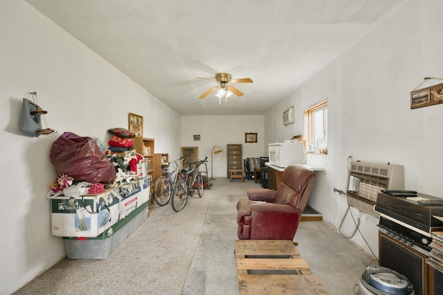 9169 W Farm Road 60, Willard, MO 65781 - living room with ceiling fan, a wall mounted air conditioner, and carpet flooring