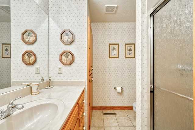 9169 W Farm Road 60, Willard, MO 65781 - bathroom featuring wallpapered walls, tile patterned flooring, baseboards, toilet, and vanity