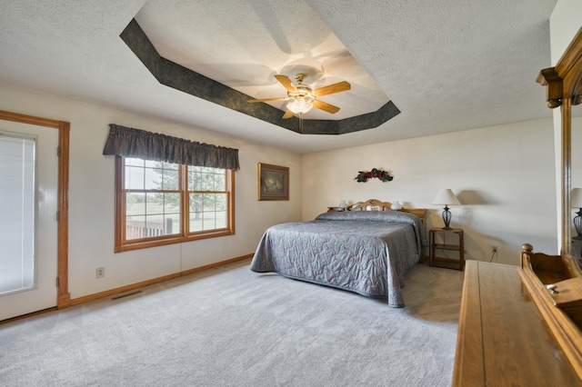 9169 W Farm Road 60, Willard, MO 65781 - bedroom featuring carpet, a textured ceiling, baseboards, and ceiling fan
