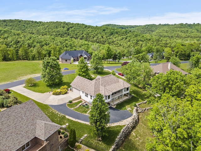 122 Arabian Way, Saddlebrooke, MO 65630 - aerial view of property and surrounding area with a forest