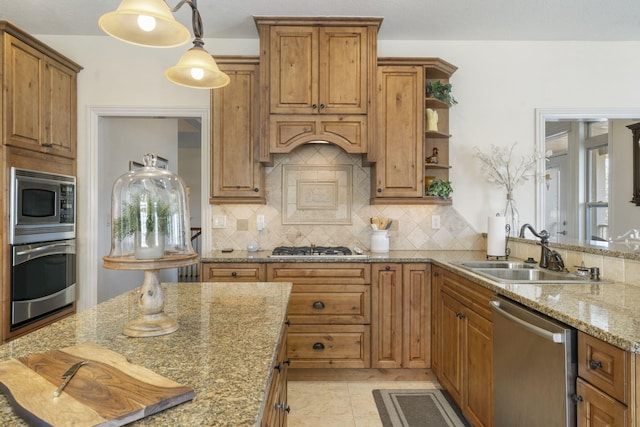 122 Arabian Way, Saddlebrooke, MO 65630 - kitchen with stainless steel appliances, a sink, brown cabinetry, and open shelves