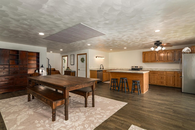 4216 Skyline Rd, Seymour, MO 65746 - dining area with recessed lighting, dark wood-style floors, stairs, and a ceiling fan
