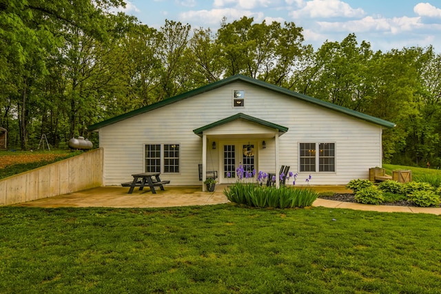 4216 Skyline Rd, Seymour, MO 65746 - rear view of property featuring french doors, a lawn, and a patio