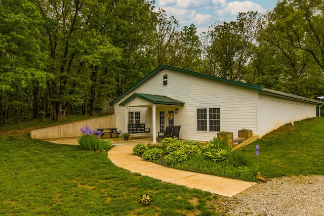 4216 Skyline Rd, Seymour, MO 65746 - view of front of property with french doors, a front lawn, and a patio