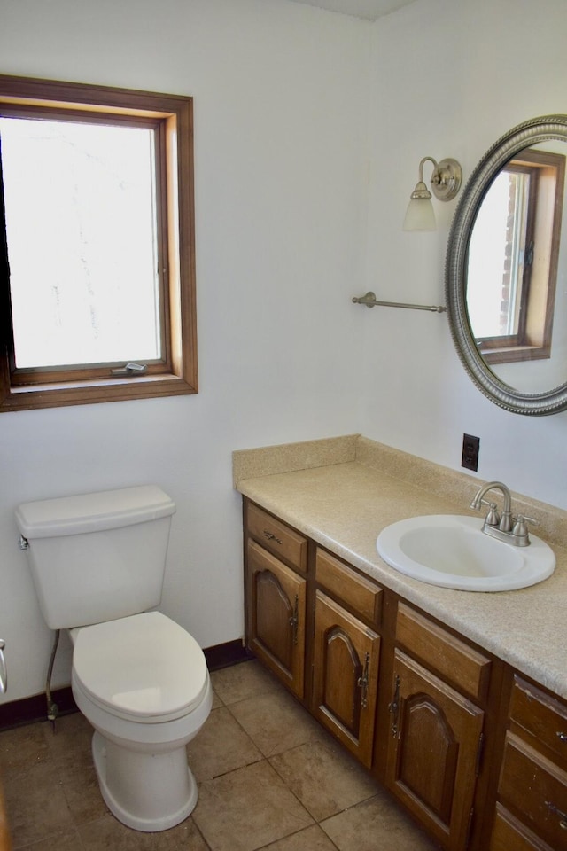 70 Dallion Ford Ln, Buffalo, MO 65622 - bathroom featuring toilet, vanity, tile patterned floors, and baseboards