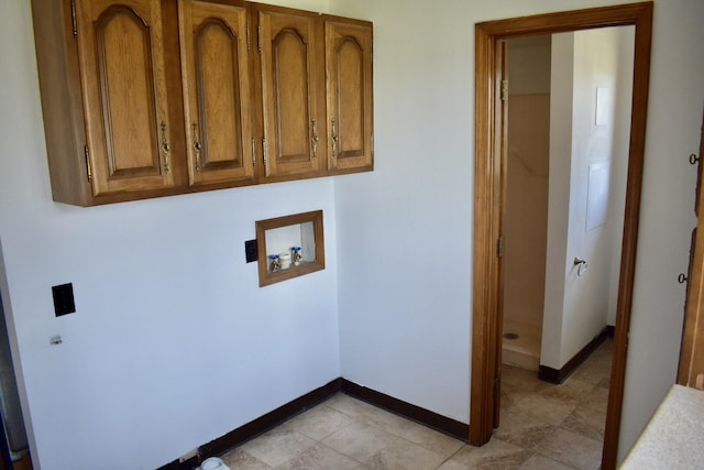 70 Dallion Ford Ln, Buffalo, MO 65622 - washroom featuring washer hookup, cabinet space, baseboards, and light tile patterned flooring