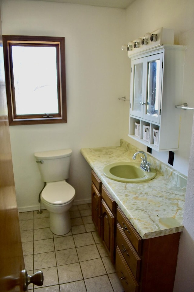 70 Dallion Ford Ln, Buffalo, MO 65622 - bathroom with toilet, baseboards, vanity, and tile patterned flooring