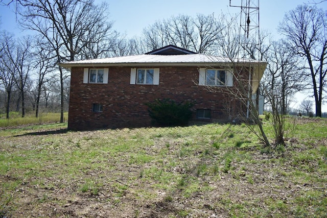 70 Dallion Ford Ln, Buffalo, MO 65622 - view of property exterior with brick siding and metal roof