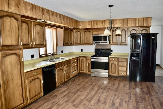 70 Dallion Ford Ln, Buffalo, MO 65622 - kitchen with black appliances, a sink, light countertops, and dark wood finished floors