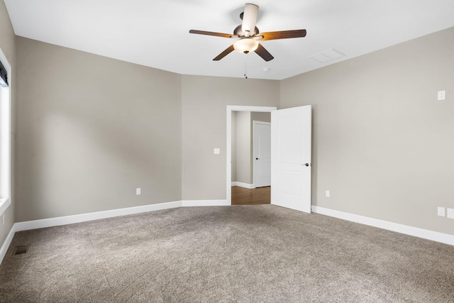 311 Stillwood Dr, Branson, MO 65616 - unfurnished room with carpet flooring, ceiling fan, and baseboards