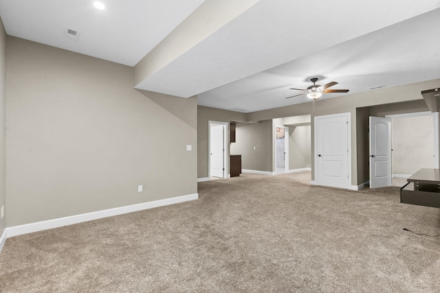 311 Stillwood Dr, Branson, MO 65616 - unfurnished living room with carpet flooring, a ceiling fan, and baseboards