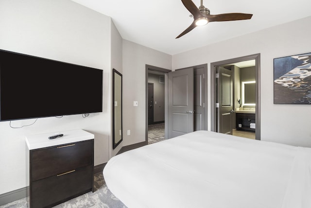 2513A Branson Landing Blvd, Branson, MO 65616 - bedroom with baseboards, ensuite bath, and ceiling fan