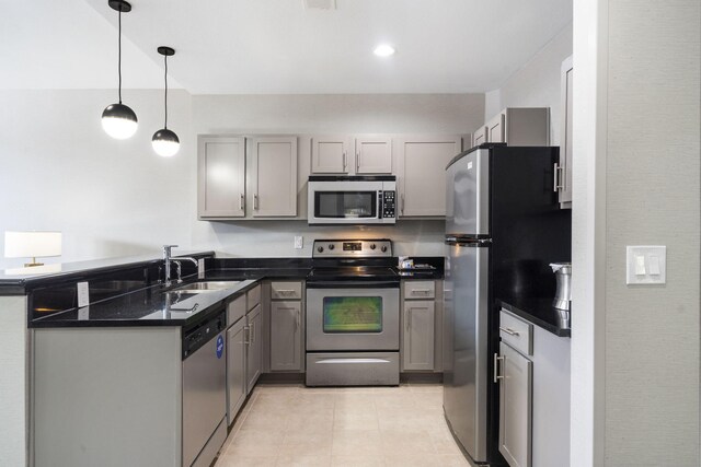 2513A Branson Landing Blvd, Branson, MO 65616 - kitchen with stainless steel appliances, gray cabinetry, a sink, light tile patterned flooring, and a peninsula