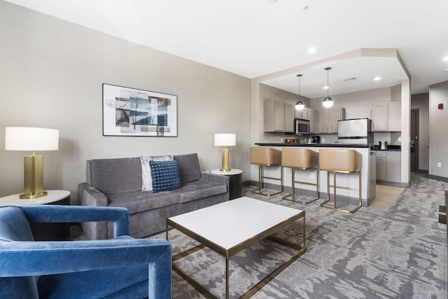 2513A Branson Landing Blvd, Branson, MO 65616 - living area featuring baseboards and light carpet